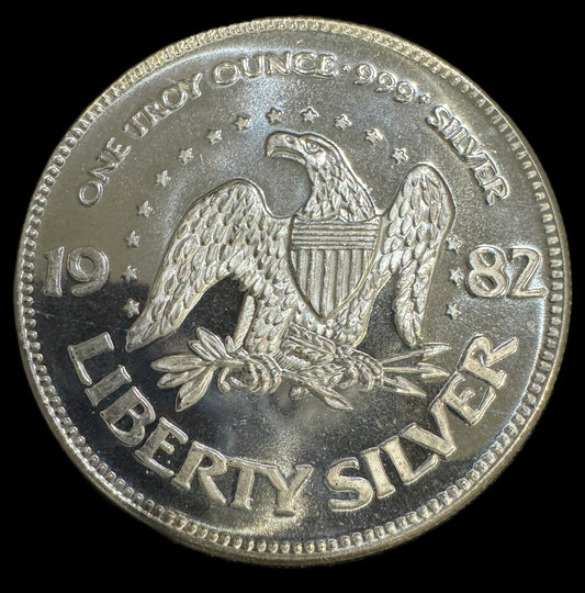 1982 American Eagle Liberty Bell A-Mark 1oz .999 Silver Coin