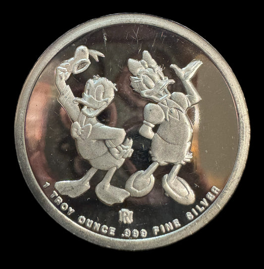 1988 Disney Around the World "Donald & Daisy" 1 oz .999 Silver Coin